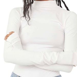 Free People seamless turtleneck sweater.